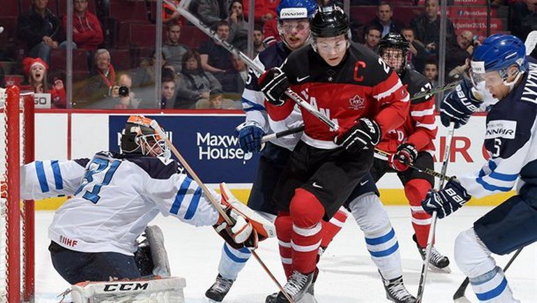 Финляндия - Канада: дальше пойдет только один. Фото IIHF