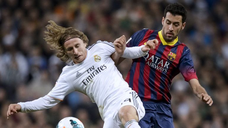 Sergio Busquets (right) against Luka Modric. Photo AFP Sergio Busquets (right) against Luka Modric. Photo AFP