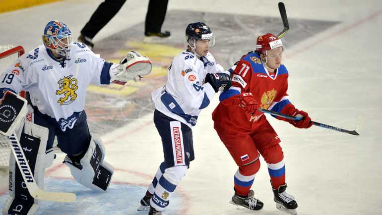 Миро ХЕЙСКАНЕН (в центре), Микко КОСКИНЕН (слева) и Кирилл КАПРИЗОВ. Фото REUTERS