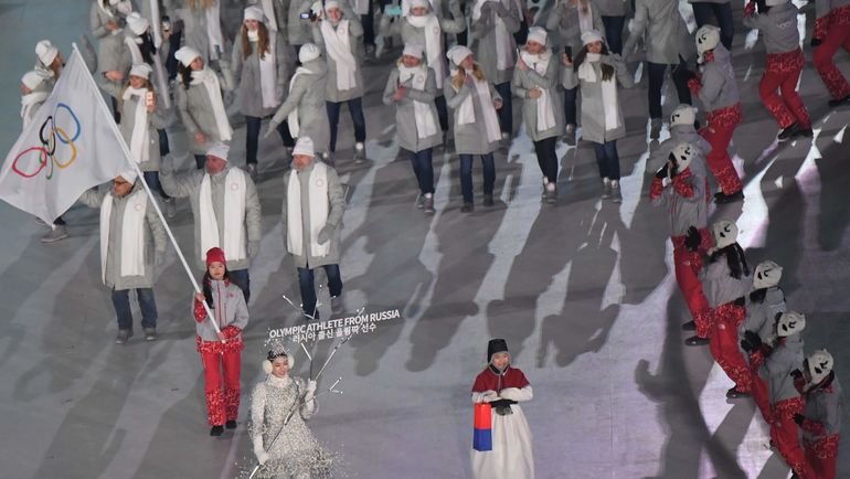 9 февраля на церемонии открытия Игр в Пхенчхане российская делегация прошла под олимпийским флагом. Что будет 25 февраля на закрытии? Фото AFP 9 февраля на церемонии открытия Игр в Пхенчхане российская делегация прошла под олимпийским флагом. Что будет 25 февраля на закрытии? Фото AFP