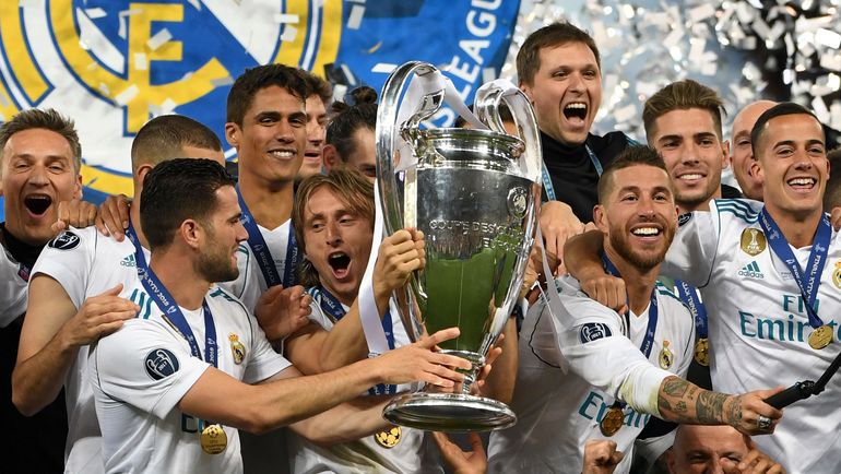 26 мая 2018 года. Лука МОДРИЧ (в центре) выигрывает с "Реалом" Лигу чемпионов. Фото AFP