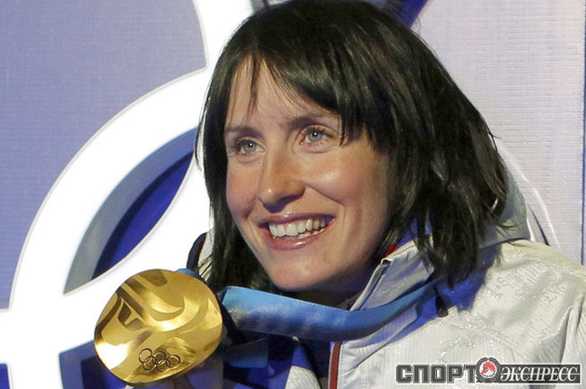 Марит Бьорген Олимпийская чемпионка 2014 г