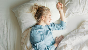 Полезные свойства утяжеленных одеял для сна