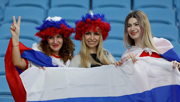 Болельщицы с флагом и эмоции Карпина: ничья сборной России с Катаром