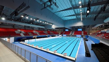 На сайте World Aquatics российские спортсмены обозначены флагом РФ