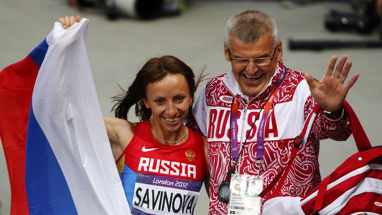 Владимир КАЗАРИН с Марией САВИНОВОЙ. Фото REUTERS